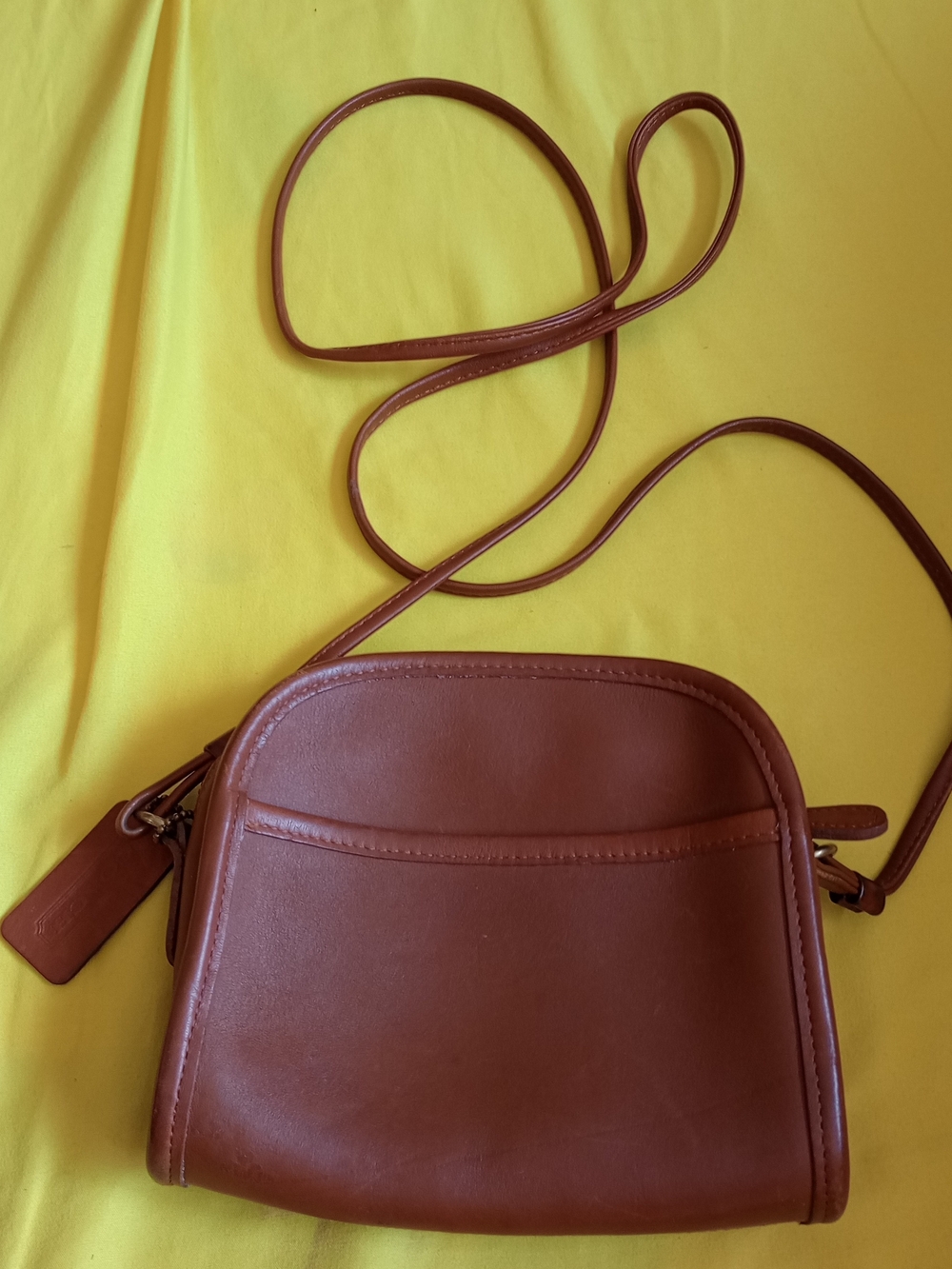 Vintage Coach Abbie 9017 crossbody bag in brown leather.